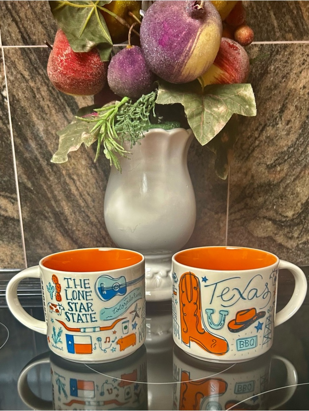 2 Starbucks White Ceramic Mugs with Bright Orange Interior and Teal Graphics